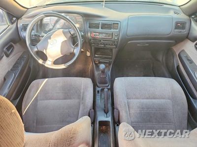 Zdjęcie 8 z 12 samochodu: 1995 TOYOTA COROLLA DX VIN:JT2AE09V7S0097827 - miniatura