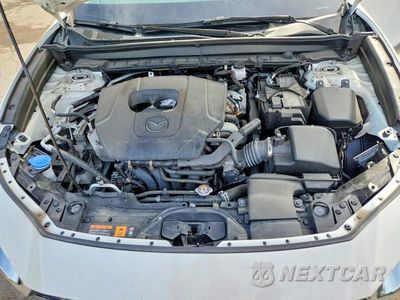 Zdjęcie 12 z 13 samochodu: 2024 MAZDA CX-30 VIN:3MVDMBAM6RM660510 - miniatura