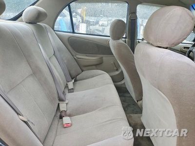 Zdjęcie 10 z 13 samochodu: 2002 TOYOTA COROLLA CE VIN:2T1BR12E42C540859 - miniatura