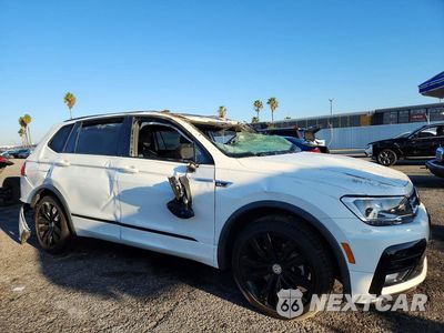 Czwarte zdjęcie samochodu z boku: 2021 VOLKSWAGEN TIGUAN SE VIN:3VV2B7AX4MM067194 - miniatura