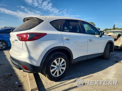 Trzecie zdjęcie samochodu z tyłu: 2016 MAZDA CX-5 TOURING VIN:JM3KE2CY0G0800273 - miniatura