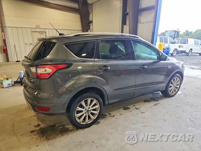 Trzecie zdjęcie samochodu z tyłu: 2017 FORD ESCAPE TITANIUM VIN:1FMCU9J94HUD57989 - miniatura