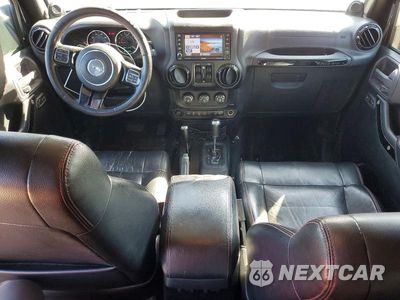 Zdjęcie 8 z 13 samochodu: 2012 JEEP WRANGLER UNLIMITED SAHARA VIN:1C4BJWEG7CL255536 - miniatura