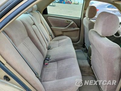 Zdjęcie 10 z 12 samochodu: 1999 TOYOTA CAMRY LE VIN:JT2BG28K4X0366651 - miniatura