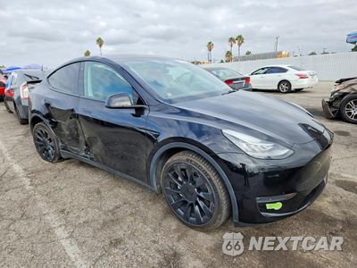 Czwarte zdjęcie samochodu z boku: 2023 TESLA MODEL Y VIN:7SAYGDEE4PA118154 - miniatura