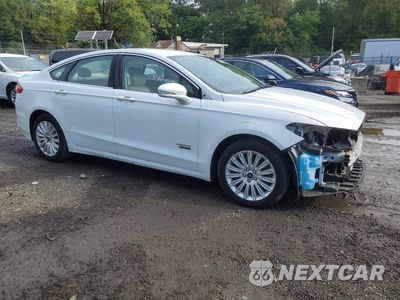 Czwarte zdjęcie samochodu z boku: 2014 FORD FUSION SE PHEV VIN:3FA6P0PU1ER397679 - miniatura