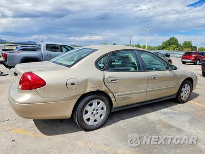 Trzecie zdjęcie samochodu z tyłu: 2001 FORD TAURUS LX VIN:1FAFP52U11G147042 - miniatura