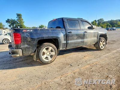 Trzecie zdjęcie samochodu z tyłu: 2017 CHEVROLET SILVERADO K1500 LT VIN:3GCUKREC5HG360780 - miniatura