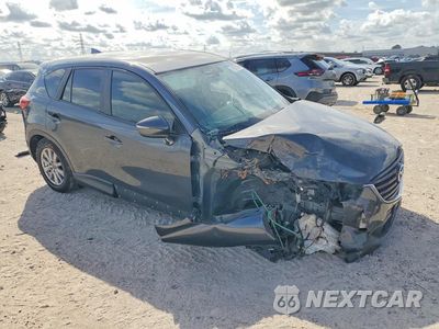 Czwarte zdjęcie samochodu z boku: 2016 MAZDA CX-5 SPORT VIN:JM3KE2BY6G0821355 - miniatura