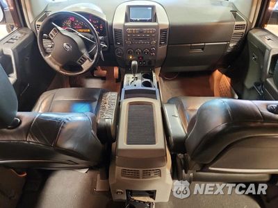 Zdjęcie 8 z 13 samochodu: 2004 NISSAN ARMADA SE VIN:5N1AA08B34N741528 - miniatura