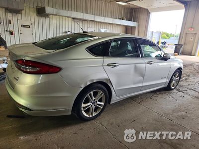 Trzecie zdjęcie samochodu z tyłu: 2018 FORD FUSION SE HYBRID VIN:3FA6P0LU5JR147605 - miniatura