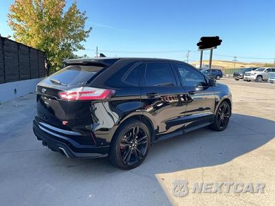 Czwarte zdjęcie samochodu z boku: 2019 FORD EDGE ST VIN:2FMPK4AP2KBB95737 - miniatura