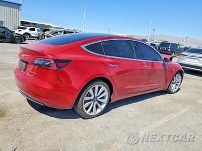 Trzecie zdjęcie samochodu z tyłu: 2019 TESLA MODEL 3 VIN:5YJ3E1EB7KF192083 - miniatura