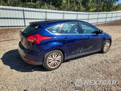 Trzecie zdjęcie samochodu z tyłu: 2017 FORD FOCUS TITANIUM VIN:1FADP3N23HL279579 - miniatura