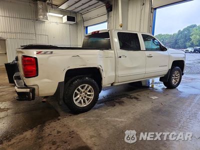 Trzecie zdjęcie samochodu z tyłu: 2017 CHEVROLET SILVERADO K1500 LT VIN:3GCUKREC0HG299547 - miniatura