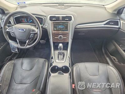 Zdjęcie 8 z 12 samochodu: 2016 FORD FUSION TITANIUM HEV VIN:3FA6P0RU3GR145996 - miniatura
