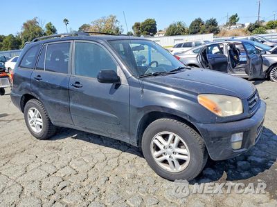 Czwarte zdjęcie samochodu z boku: 2002 TOYOTA RAV4 BASE VIN:JTEGH20V320069052 - miniatura