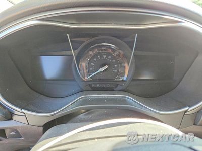 Zdjęcie 9 z 12 samochodu: 2016 FORD FUSION TITANIUM PHEV VIN:3FA6P0SU4GR405400 - miniatura