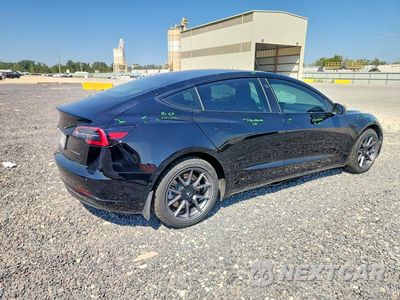 Trzecie zdjęcie samochodu z tyłu: 2021 TESLA MODEL 3 VIN:5YJ3E1EB2MF978800 - miniatura