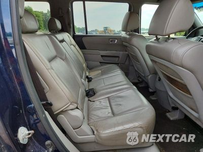 Zdjęcie 11 z 13 samochodu: 2011 HONDA PILOT EXL VIN:5FNYF4H52BB049200 - miniatura