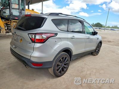 Trzecie zdjęcie samochodu z tyłu: 2017 FORD ESCAPE SE VIN:1FMCU0GD1HUD03475 - miniatura