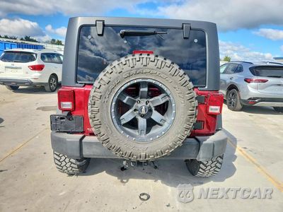 Zdjęcie 6 z 13 samochodu: 2013 JEEP WRANGLER UNLIMITED SPORT VIN:1C4HJWDG1DL604963 - miniatura