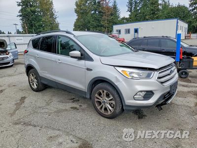 Czwarte zdjęcie samochodu z boku: 2018 FORD ESCAPE SE VIN:1FMCU9GD2JUD08145 - miniatura
