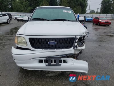 Piąte zdjęcie samochodu w środku: 2000 FORD F150 SVT LIGHTNING VIN:2FTZF0738YCA82702 - miniatura