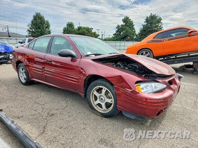 Czwarte zdjęcie samochodu z boku: 2002 PONTIAC GRAND AM SE1 VIN:1G2NF52E42M663792 - miniatura