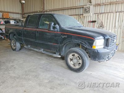 Czwarte zdjęcie samochodu z boku: 2004 FORD F350 SRW SUPER DUTY VIN:1FTSW31P54EC94122 - miniatura