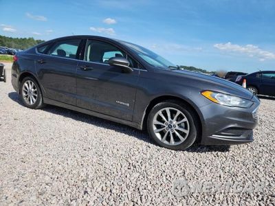 Czwarte zdjęcie samochodu z boku: 2017 FORD FUSION SE HYBRID VIN:3FA6P0LU7HR297161 - miniatura