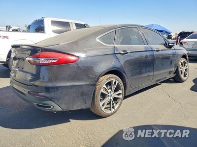 Trzecie zdjęcie samochodu z tyłu: 2020 FORD FUSION TITANIUM VIN:3FA6P0D9XLR137696 - miniatura