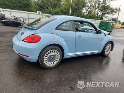 Trzecie zdjęcie samochodu z tyłu: 2016 VOLKSWAGEN BEETLE SE VIN:3VWJ17AT3GM607047 - miniatura