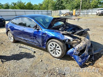 Czwarte zdjęcie samochodu z boku: 2023 TESLA MODEL 3 VIN:5YJ3E1EA8PF552377 - miniatura