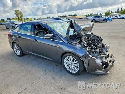Czwarte zdjęcie samochodu z boku: 2017 FORD FOCUS TITANIUM VIN:1FADP3J25HL238957 - miniatura