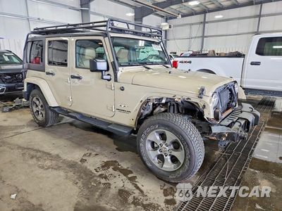 Czwarte zdjęcie samochodu z boku: 2017 JEEP WRANGLER UNLIMITED SAHARA VIN:1C4BJWEG0HL589236 - miniatura