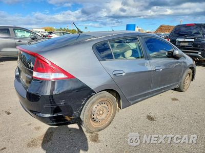 Trzecie zdjęcie samochodu z tyłu: 2014 HONDA INSIGHT VIN:JHMZE2H37ES001644 - miniatura