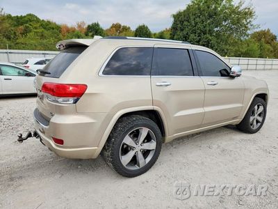 Trzecie zdjęcie samochodu z tyłu: 2015 JEEP GRAND CHEROKEE OVERLAND VIN:1C4RJFCT0FC688179 - miniatura