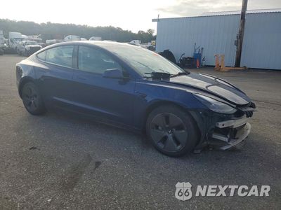 Czwarte zdjęcie samochodu z boku: 2022 TESLA MODEL 3 VIN:5YJ3E1EAXNF370385 - miniatura