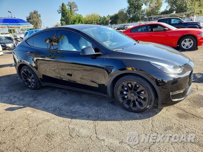 Czwarte zdjęcie samochodu z boku: 2024 TESLA MODEL Y VIN:7SAYGDEE1RF151988 - miniatura