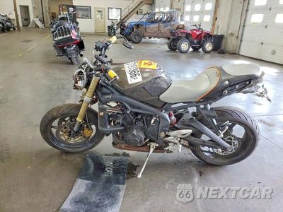 Trzecie zdjęcie samochodu z tyłu: 2008 TRIUMPH MOTORCYCLE STREET TRIPLE 675 VIN:SMTD01NE58J339324 - miniatura