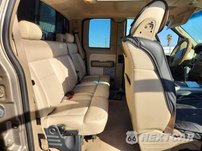 Zdjęcie 10 z 12 samochodu: 2004 FORD F150 VIN:1FTPX12514NA67594 - miniatura