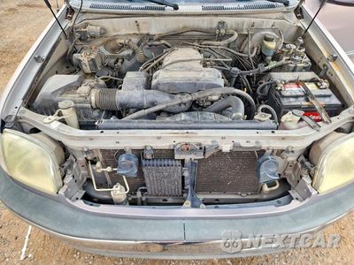Zdjęcie 11 z 12 samochodu: 2002 TOYOTA TUNDRA SR5 V8 VIN:5TBRT34102S312136 - miniatura