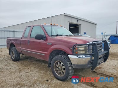 Czwarte zdjęcie samochodu z boku: 1999 FORD F250 SUPER DUTY VIN:1FTNX21L5XEE92141 - miniatura