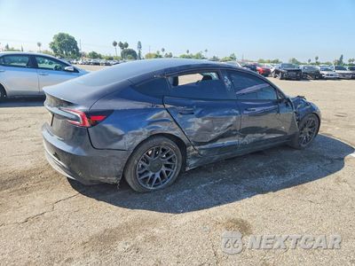 Trzecie zdjęcie samochodu z tyłu: 2024 TESLA MODEL 3 VIN:5YJ3E1EA4RF744348 - miniatura