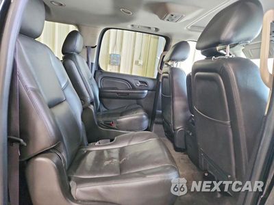 Zdjęcie 11 z 13 samochodu: 2014 GMC YUKON XL DENALI VIN:1GKS2MEF9ER105182 - miniatura