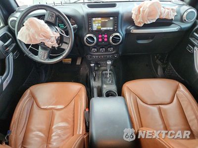 Zdjęcie 8 z 13 samochodu: 2017 JEEP WRANGLER UNLIMITED SAHARA VIN:1C4BJWEG5HL724243 - miniatura