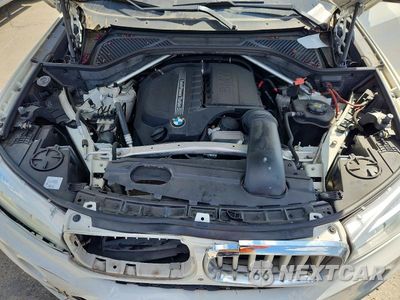 Zdjęcie 11 z 12 samochodu: 2015 BMW X5 XDRIVE35I VIN:5UXKR0C5XF0P09791 - miniatura