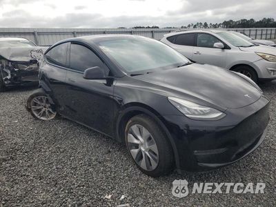 Czwarte zdjęcie samochodu z boku: 2023 TESLA MODEL Y VIN:7SAYGAEE9PF613001 - miniatura