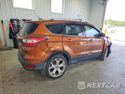 Trzecie zdjęcie samochodu z tyłu: 2017 FORD ESCAPE TITANIUM VIN:1FMCU9J99HUA68039 - miniatura